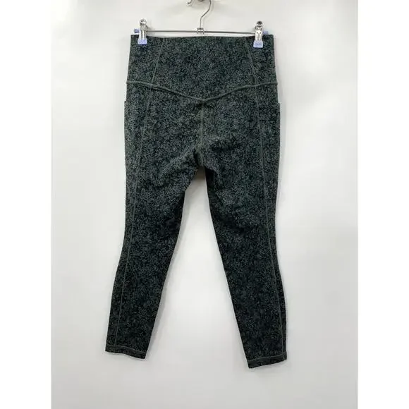 Athleta green patterned Salutation stash pocket 7/8 leggings - Picture 4 of 4